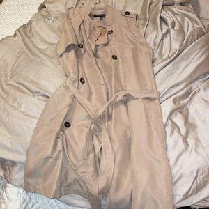 Tan sleeveless trench coat